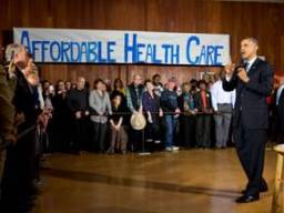 Obama-affordable-health-care-sign-428